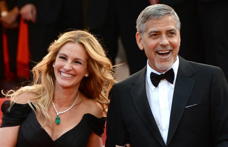 Julia Roberts usa vestido coberto em fotos de George Clooney