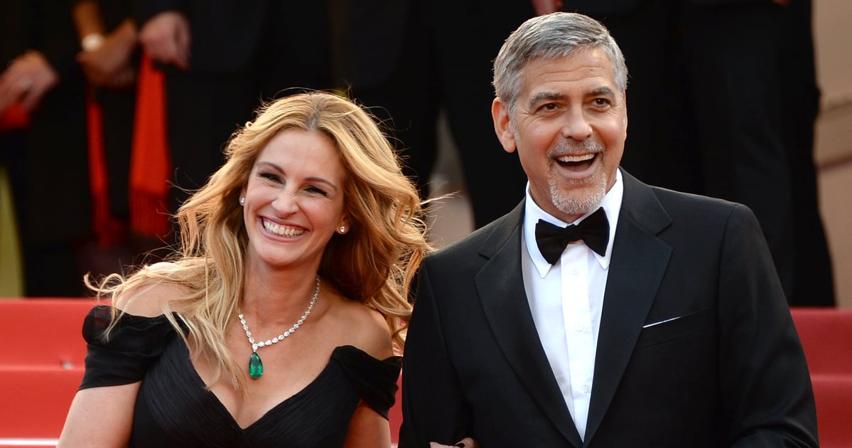 Julia Roberts usa vestido coberto em fotos de George Clooney